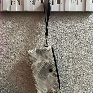 Lululemon Athletica Black and White Manifesto print Wristlet